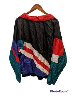 This listing is for one unique vintage windbreaker by the brand Santana. This cool 90s piece is made of nylon and has a color block pattern. Great condition with minor wear from use. it is size XL. Photos are part of the description. The items pictured are the only pieces included in the lot. All items come from a pet- and smoke-free home. Note that color differences may exist due to differences in monitor settings. All sales are as-is and are final. I no longer accept returns or exchanges for a Sporty Patchwork Nylon Windbreaker, Sporty Nylon Windbreaker With Patchwork, Sporty Nylon Patchwork Windbreaker, Vintage Black Nylon Windbreaker, Multicolor Patchwork Track Jacket For Streetwear, Casual Multicolor Patchwork Windbreaker, Multicolor Nylon Track Jacket For Streetwear, Sporty Multicolor Patchwork Windbreaker, Casual Multicolor Nylon Windbreaker