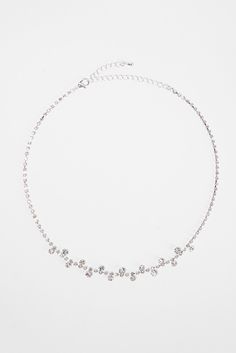 This elegant Danica Bridal Bubble Chain Necklace adds a touch of sophistication and glamour to any bridal ensemble. The cascading design features delicate bubbles of varying sizes, creating a mesmerizing effect when paired with the sparkling chain. Perfect for the modern bride looking to make a statement on her special day. SizeL:16+1IN QualityMade with quality Materials for endurance. ImportedN4686CRG Glamorous Rhinestone Necklace For Wedding With Adjustable Chain, Sparkling Metal Rhinestone Necklace For Wedding, Silver Delicate Chain Backdrop Necklace For Party, Elegant Chain Necklace For Wedding, Wedding Rhinestone Necklace With Adjustable Chain, Elegant Rhinestone Chain Necklace For Wedding, Elegant Rhinestone Wedding Chain Necklace, Elegant Wedding Chain Necklace With Rhinestones, Glamorous Wedding Chain Necklace