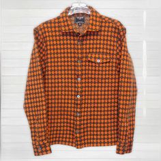 *Perfect Condition, Nwot, Zero Flaws* Brown & Orange Argyle Pattern Knit Over Shirt Featuring Button Chest Pocket As Well As Iridescent Bluish Buttons, By Luxury Brand Todd Snyder. 62% Cotton, 38% Wool Size Labeled M But Fits Like A Small* *All Luxurydrops Items Have Been Carefully Reviewed By A Luxury Industry Expert, Every Item Is Authentic Orange Workwear Top With Pockets, Orange Long Sleeve Shirt With Pockets, Orange Fall Tops With Pockets, Orange Fall Top With Pockets, Orange Top With Pockets For Fall, Orange Tops With Pockets For Fall, Classic Long Sleeve Orange Outerwear, Orange Long Sleeve Shirt For Fall, Brown Camp Collar Tops For Fall