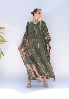 Retreat yourself with my special exquisite handmade kaftan, skillfully crafted using traditional hand tie-dye technique! This stunning kaftan robe is perfect for any occasions you attend, whether you're pairing it with bikini, shorts and a tank top or layering it over a summer dress. It's also comfortable for at-home wear too, to poolside party, or simply a walking on beach. Upgrade your wardrobe with the handmade tie dyed collection ! 🌴 This kaftan robe, be goods for size M to 4XL.  FEATURES - Maxi Length Dresses With Natural Dye For Vacation, Maxi Length Dress With Natural Dye For Vacation, Maxi Length Vacation Dresses With Natural Dye, Oversized Long Maxi Dress For Beach, Flowy Maxi Dress With Natural Dye, Green Hippie Kaftan For The Beach, Oversized Long Kaftan For Festivals, Bohemian Beach Kaftan With Natural Dye, Summer Festival Kaftan With Natural Dye