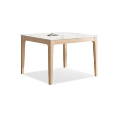 the table is made from wood and has a white marble tabletop on one side