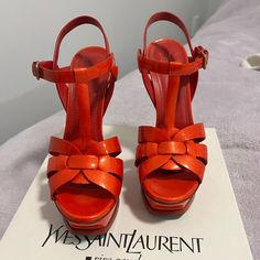 Size 37, Soles Are Redone. Damages Are Shown In Pics. Red-Orange Patent Leather Orange Platform Heels With Closed Toe, Luxury Orange Heels For Spring, Orange Closed Toe Evening Sandals, Evening Closed Toe Orange Sandals, Orange Platform Sandals With Ankle Strap, Chic Orange Sandals With Round Toe, Orange Heels With Heel Loop For Evening, Orange Open Heel Heels With Padded Heel, Evening Orange Sandals With Heel Strap