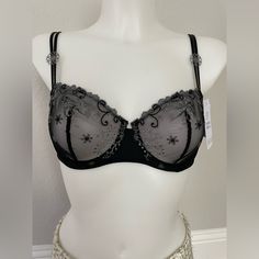 Brand New With Tag Color: Black Simone Perele Sheer Demi Bra Decorated With Ultra-Sensual Embroidery. Sheer Demi Cups With Scalloped Trim; Vertical Seams Add Lift. Wider Set Straps Create An Open Neckline That Flatters Your Dcollet. Doubled Adjustable Spaghetti Straps With Flower Detail. Solid Microfiber Band; Hook-And-Eye Closure. Polyester/Spandex/Nylon. Made In Tunisia Of Moroccan Material. Black Delicate Lace Bra For Evening, Black Delicate Lace Evening Bra, Elegant Fitted Sheer Bra, Fitted Floral Embroidery Bra, Night Out Bra With Delicate Lace, Fitted Delicate Lace Bra For Night Out, Demi Cup, Simone Perele, Scalloped Trim