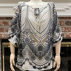 Gorgeous Ivory, Tan And Grey Floral Top By Romeo & Juliet Couture. The Tag Says Xs But This Top Runs Large And Can Fit Up To A Size Medium! New Without Tags. 100% Polyester Originally $125. Get It Here, New W/O Tags, For 1/5 The Original Price!! Bundle Any 3+ Items And Save 15% On Your Whole Order! Got A Question? Comment Below! I’m Open To Reasonable Offers. Poshmark Ambassador Ii 5.0 Rated Seller Check My About Me Section To Read My Love Notes! I Include A Free Gift With Every Purchase! 1064 Monochrome Prints, Couture Tops, Running Tops, Floral Print Tops, Grey Floral, Romeo And Juliet, Floral Tops, Top Blouse, Floral Prints