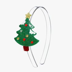 a headband with a christmas tree on it and a star hanging from the top