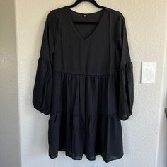 Tiered, Swing/Mini/Shift Dress In Solid Black Color. Pull On, No Zippers, Buttons Or Fasteners. Comfortable And Flowy, And Easy To Pair With Boots, High Heels, Sandals, Or Leggings And Sneakers 100% Dracon/Polyester Material Machine Washable *Brand New Without Tags, Never Worn Other Than To Try On Casual Black V-neck Dress For Brunch, Amazon V-neck Dresses For Brunch, V-neck Brunch Dresses By Amazon, Chic V-neck Mini Dress By Amazon, Spring V-neck Mini Dress By Amazon, Amazon Casual Midi Dress For Brunch, Amazon Long Sleeve Summer Dresses, Casual Amazon Midi Dress For Brunch, Amazon V-neck Brunch Dresses