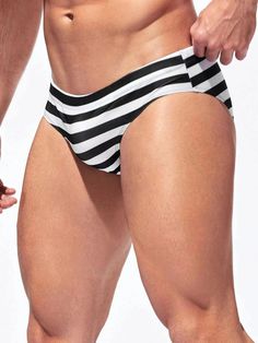 Elevate your beachwear collection with our Striped Print Fabric Swim Brief. Designed with a captivating striped pattern, these briefs bring a touch of sophistication to your swim ensemble. The high-stretch fabric ensures a snug and comfortable fit, allowing you to move freely during water activities. Specifications Pattern Type: Striped Type: Briefs Fabric: High Stretch Material: Fabric Composition: 90% Polyester, 10% Elastane Care Instructions: Machine wash, do not dry clean, wash with the soft Beach Striped Stretch Swimwear, Striped Stretch Swimwear For Beach, Striped Swim Trunks For Swimming, Striped Swim Trunks For Beachwear, Striped Swim Trunks For Swimming Beachwear, Striped Stretch Swimwear For Sports, Striped Stretch Swimwear For Sunbathing, White Swimwear With Contrast Stripes For Swimming, Striped Fitted Swimwear For Sports