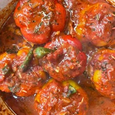 tomatoes and peppers are cooked in tomato sauce