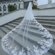 a wedding veil on top of some steps