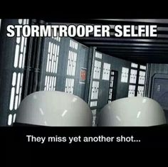 there are two white balls in the middle of a room that says stormtrooper selfie they miss yet another shot