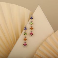 The colorful Confetti Veil earrings are chic and fun earrings with an intricate design and an out-of-the-box attitude. These flamboyant and colorful earrings can complement almost any attire, especially monochromes that need a pop of color. This is the perfect gift for the person in your life who wants more out of life. Luxury Multicolor Drop Earrings, Luxury Multicolor Earrings For Evening, Luxury Multicolor Earrings With Gemstone Accents, Elegant Multicolor Earrings For Formal Occasions, Luxury Multicolor Earrings For Formal Occasion, Elegant Multicolor Earrings For Evening, Multicolor Gemstone Accented Fine Jewelry Earrings, Multicolor Gemstone-accented Fine Jewelry Earrings, Luxury Multicolor Sterling Silver Earrings