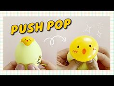 two small yellow toys are being held by someone's hands with the words push pop