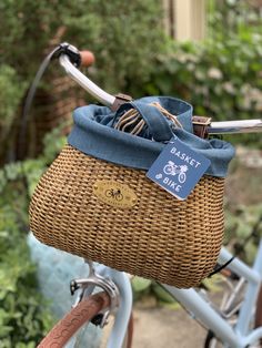 a basket on the handlebars of a bicycle