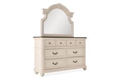 a white dresser with a mirror on top and drawers below it, in front of a white background