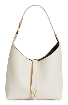 This slouchy calfskin-leather hobo bag blends a modern aesthetic with a '70s folk spirit, and of course has the Marcie line's signature slip-tassel closure. Tassel closure Shoulder strap Interior zip pocket Leather Made in Italy Designer Handbags This brand has B Corp certification, representing business practices with emphasis on social and environmental performance, accountability and transparency This brand meets Nordstrom Responsible Brands criteria: brand adheres to responsible social and e Designer Bucket Hobo Bag With Gold-tone Hardware, Designer Everyday Hobo Tote Bag, Designer Hobo Tote Bag For Everyday, Modern Hobo Shoulder Bag With Gold-tone Hardware, Cream Bucket-shaped Hobo Bag, Modern Cream Leather Hobo Bag, Luxury Beige Hobo Bag For Errands, Luxury Bucket Shape Hobo Bag For Errands, Luxury Bucket Hobo Bag For Errands