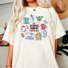 a woman with blonde hair wearing a white t - shirt that says school supplies on it