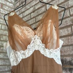 To Absolutely Die For. This Is Part Of A Huge Vintage Lingerie Collection. I’m Listing These For A Collector. It Has Been Folded In Storage For Many Years. No Smoke Or Pets 1960s Vanity Fair Under Arms :36 W 28 Hips Free Front Shoulder To Hem 42.7 Diameter Of Hemline :88 The Only Issue Is A Place On The About 1-1 5 “ On The Waist . It Has Come Unsewn. No Other Issues. Cream Sleeveless Sheer Sleepwear, Vintage Beige Dress For Wedding Night, Vintage Sheer Sleepwear, Vintage Sheer Sleepwear For Evening, Sheer Cream Nightgown For Wedding Night, Vintage Sheer Lace Nightgown, Vintage Sheer Lace Sleepwear, Vintage Sheer Sleeveless Sleepwear, Vintage Sheer Nightgown For Wedding Night