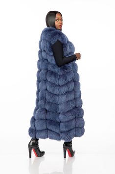 The Gina Full Length Fox Fur vest is an iconic pice that will keep you stylish and warm. This vest features 100% genuine fox fur panel, is lined with satin, and closes with hooks. The length of this vest is 130cm/ 51 inches. This vest runs true to size. If you want a more relaxed fit, please order one size up. Model is typically a size Large and is wearing a size XL in the color Fancy Blue. The Gina vest can be customized in any color and any size. Due to the customizable nature, this piece can Cowboys Outfits, Fur Vest Outfit, Fur Vest Outfits, Black Faux Fur Vest, Fox Fur Vest, Fur Gilet, Faux Fur Vest Black, Winter Fur Coats, Grey Fur