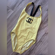 Chanel Vintage One-Piece Swimsuit In A Rare Yellow Color. There Are No Tags As They Have Been Cut Off. There Are Some Markings On The Exterior. Overall A Good Condition. It Fits A Size Small. Chanel Swimwear, Chanel Swim, Chanel Vintage, Vintage Chanel, Yellow Color, Cut Off, Womens Swim, One Piece Swimsuit, Cool Outfits