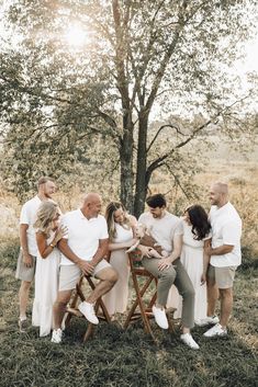 beautiful family photos with perfect neutral outfits perfect for summer in Wisconsin Big Family Photo Shoot Ideas Summer, Tan And White Family Photos, Family Pics Summer, Group Family Photoshoot, Extended Family Studio Photoshoot, Family Portrait Outfits Summer, All White Family Photoshoot, Family Photos Neutral Colors