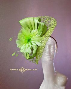 Handmade Silk and Paper Feathered Fascinator Structured crisscross woven material with apple green silk and matching feather burst. Easy-to-wear headband fascinator makes a statement, and can be worn to a myriad of events: Easter, bridal, derby, Del Mar races, hat contests, church, galas, Kentucky Derby, Melbourne Cup, high tea, weddings, cocktail parties, and more. Some customization available as this is made-to-order; please message with your requests to see if we can meet your needs.   *FREE SHIPPING  For more STATEMENT JEWELRY and HANDMADE HATS go to www.aimeesfuller.com Aimee Fuller has been a trusted online seller since 1999, and is excited to bring her creations back to Etsy.  Though often copied by hobbyists and even high-end department stores, discriminating fashionistas from all Spring Formal Fitted Costume Hats And Headpieces, Fitted Summer Headpiece For Church, Spring Adjustable Sinamay Fascinator, Fitted Headpieces For Spring, Spring Sinamay Mini Hats For Races, Adjustable Sinamay Headpiece For Spring, Fitted Top Hat With Curved Brim For Spring, Green Short Brim Straw Hat For Kentucky Derby, Fitted Headpieces For Summer Races