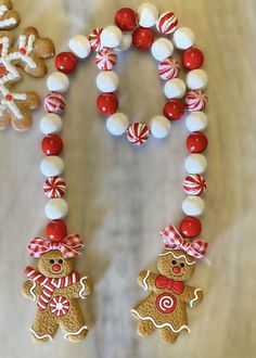 two gingerbreads and some candy on a table