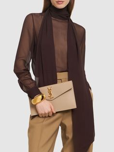 Height: 16cm Width: 27cm Depth: 2cm. Front flap with magnetic button closure. Front metal logo The Saint, Dark Beige, Monogrammed Leather, Flat Espadrilles, Metal Logo, Swim Accessories, Shearling Jacket, Royal Fashion, Leather Pouch