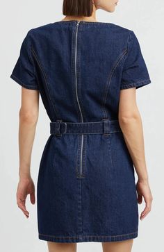 Get ready for a playful summer in the EN SAISON June Denim Mini Dress! With a belted waist, princess seams, and an exposed back zipper, this dress is both flattering and functional. The square neckline and short sleeves add a touch of retro charm. Perfect for sunny days or warm nights. **Sizing notes: True to size. XS=0-2, S=4-6, M=8-10, L=12-14. 33" length - taken from size S. MATERIALS: 100% Cotton CARE: Hand wash. Line dry. Casual Fitted Mini Length Belted Dress, Chic Fitted Belted Denim Dress, Casual Fitted Dress With Belt, Chic Medium Wash Belted Denim Dress, Fitted Medium Wash Belted Denim Dress, Fitted Denim Blue Belted Dress, Fitted Belted Denim Dress In Denim Blue, Belted Denim Mini Dress, Fitted Belted Denim Dress