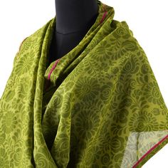 MATYO GREEN PRINTED MULMUL SCARF / STOLEMaterialsSoft mulmul / fine cotton voileDimensions65X200 cms OR 25X80 inchesA very summary vibrant Green Matyo print scarf accented with hot pink piping on one side This scarf is super soft and stylish,a perfect gift for any occasion for your loved ones. The Print pattern is inspired by timeless classic motif & patterns of vibrant and colourful Hungarian Embroidery style MATYO which has thick, lush stitches – packed with color and flowers, especially r Green Dupatta Scarf Shawl, Traditional Green Cotton Scarves, Green Bohemian Style Dupatta, Green Printed Cotton Dupatta, Green Floral Print Dupatta For Summer, Summer Floral Print Green Dupatta, Pista Green Cotton Dupatta With Printed Motifs, Green Cotton Dupatta With Floral Print, Green Bohemian Dupatta With Floral Print