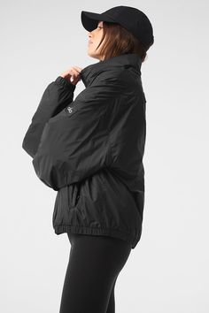 Running to your workout in the rain? Reach for the Latitude Pullover. It’s lightly filled (for a touch of warmth) with functional details like a half-zip collar, zippered side pockets, banded cuffs and a banded hem. Fitwise, it’s generous and oversized. And it’s made from 100 percent nylon—the kind that’s durable, swishy and ready to face the elements. Nylon Half-zip Sportswear Outerwear, Black Technical Windbreaker For Fall, Technical Black Windbreaker For Fall, Black Waterproof Windbreaker In Athleisure Style, Black Waterproof Athleisure Windbreaker, Functional Black Nylon Track Jacket, Black Half-zip Techwear Windbreaker, Alo Yoga Long Sleeve Athleisure Outerwear, Black Half-zip Windbreaker For Outdoor Activities