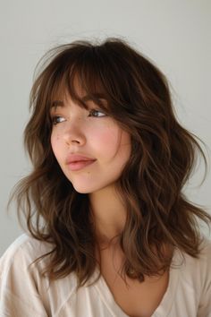 18  Wolf Cut Hairstyles That Are So Edgy And Chic Fun Layered Haircut, Wolf Cut With Straight Bangs, Wolf Cut Inspo Medium, Kids Wolf Cut Hair, Wolf Haircut Medium, Wolf Cut Blowout, Butterfly Cut Vs Wolf Cut, How To Style Medium Layered Hair, Medium Hair Cuts Trend 2025