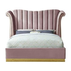 an upholstered bed with pink velvet headboard and foot board, in front of a white background