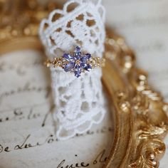 a close up of a ring on a piece of paper