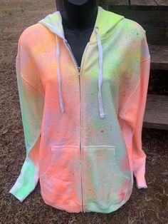 Here is a new addition to our tie dye items. Now you have the opportunity to have a zip hoodie with these colors as well as a regular hoodie.  The tie dye hoodie is in another listing in my shop. Feel free to look around. If you have any questions you can send me a message.  Each tie dye zip up hoodie is 50% Cotton and 50% Polyester. They are soft and comfortable and fit great!  We use men's zip ups as they are a little more roomy and comfortable. Please order your size accordingly.  This would make a great gift for yourself or someone who likes unique items.  Thank you for stopping by. Feel free to check out the many other items we have to offer! =) Neon Jacket, Hippie Shirt, Hoodies For Women, Dye Hoodie, Tie Dye Shirts, Hoodie Zip, Cool Ties, Unisex Jacket, Tie And Dye