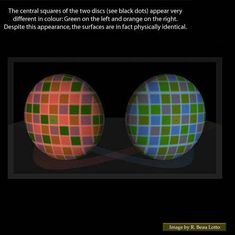 an image of two balls with different colors and patterns on them, in the dark