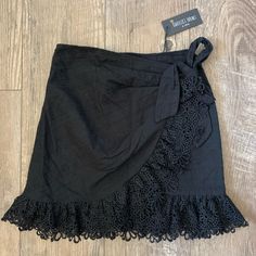 Nwt! From Boutique Isabelles Cabinet Eyelet Ruffle Wrap Mini Skirt. Spring Lace Trim Skirt For Night Out, Black Lace Trim Mini Skirt For Summer, Black Lace Mini Skirt For Spring, Black Lace Mini Skirt For Summer, Black Skirt With Lace Trim For Summer, Lace Ruffled Skirt For The Beach, Lace Ruffled Beach Skirt, Lace Ruffled Skirt For Beach, Black Lace Trim Skirt For Summer