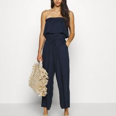 Hollister Women's Strapless Jumpsuit- Navy New With Tag, Never Worn. Please Note: The Pictures Are Of An Xl Which Sold But We Have Xs Available. Please Order From Listing Size And Not Photos. Items Are Identical. #162 Chic Bandeau Jumpsuits And Rompers For Beach, Casual Bandeau Jumpsuits And Rompers For Vacation, Casual Strapless Jumpsuits And Rompers For Beach Season, Casual Blue Strapless Jumpsuits And Rompers, Casual Blue High Waist Strapless Jumpsuit, Casual Blue High-waisted Strapless Jumpsuit, Blue High Waist Strapless Jumpsuit For Summer, Casual Bandeau Strapless Jumpsuit For Day Out, Blue Strapless Jumpsuit For Spring Day Out