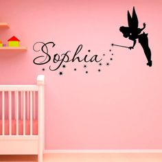 a child's room with a wall decal that says, sophia