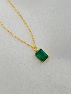 Green Emerald Necklace With Adjustable Chain, Green Emerald Jewelry With Delicate Chain, Green Delicate Chain Jewelry For Party, Formal Green Necklace With Delicate Chain, Green Delicate Chain Charm Necklace, Green Charm Necklace With Delicate Chain, Green Dainty Chain Necklace, Green Dainty Clavicle Chain Necklace, Emerald Necklaces With Delicate Green Chain