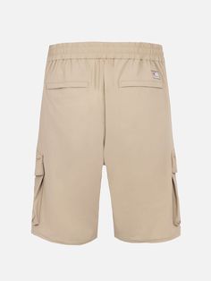 Discover the versatility of our Deck Bermuda shorts, crafted from technical Lycra fabric for enhanced performance. With its water-resistant properties and lightweight, breathable design, these shorts are perfect for all your outdoor adventures. The Deck Bermuda shorts are constructed from technical Lycra fabric, offering water-resistant capabilities and exceptional breathability. The elasticated waistband features a drawstring button closure for a secure and comfortable fit. Multiple pockets, in Solid Cargo Pants With Built-in Shorts For Outdoor Activities, Cargo Pants With Built-in Shorts For Outdoor Activities, Khaki Cargo Shorts With Functional Pockets, Outdoor Cargo Pants With Functional Pockets, Outdoor Short Cargo Pants With Functional Pockets, Functional Cargo Pants For Summer Outdoor Activities, Solid Color Cargo Shorts For Outdoor Activities, Outdoor Cargo Shorts With Functional Pockets, Khaki Bermuda Bottoms For Outdoor