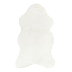 a white sheepskin rug on a white background