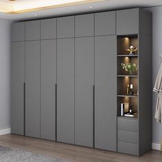 a room with grey cabinets and lights in it