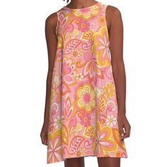 Loose-fit, mid-length sleeveless dress with silky handfeel. Printed on both sides. Machine washable. Size range XS-2XL. 70's inspired design in soft warm colours Printed A-line Shift Mini Dress, Pink A-line Shift Dress, Pink Printed Sleeveless Midi Dress, Sleeveless Printed Pink Midi Dress, Pink Sleeveless Printed Midi Dress, Orange Printed Sleeveless Midi Dress, Sleeveless Printed Orange Midi Dress, Orange Sleeveless Printed Midi Dress, Flowy Sleeveless Vintage Dress