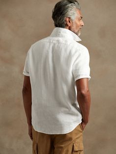 A warm-weather essential.  This elevated button-down shirt is crafted from luxurious, beautiful, naturally breathable linen, a forever-favorite fabric for its ability to stay crisp and fresh, even in heat and humidity.  Button down collar.  Chest poc Classic Linen Shirt With Rolled Sleeves, White Linen Shirt For Casual Gatherings, Classic Linen Shirt For Vacation, Elegant Linen Shirt For Vacation, Yellow Print, Button Down Collar, Shirt White, Linen Shirt, Warm Weather