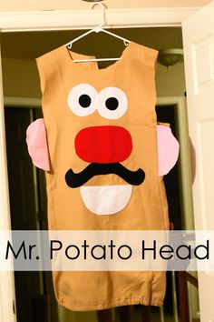 a homemade mr potato head costume hanging from a closet door with the words mr potato head on it