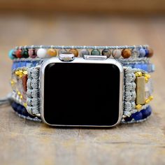 Boho Beaded Apple Watch Band Wrap Dress up your tech with this unique Apple Watch bracelet! Our wrap-around watchband is beautifully handcrafted using high-quality natural Lapis lazuli and jasper stones loomed on a natural cord. It comes with an adjustable closure to fit most wrist sizes. Refresh your smartwatch with these special beaded straps. Our boho watch strap is the perfect gift for yourself, the independent, or the free-spirited. And of course, get the benefits of the natural stones whil I Watch Bands For Women, I Watch Bands, Apple Watch Bracelets, Cord Wrap, Tiger Eye Jewelry, Rose Quartz Jewelry, Bracelet Apple Watch, Apple Watch Faces, I Watch