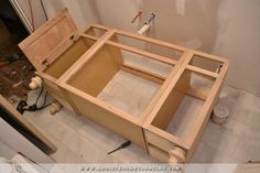 an unfinished bed frame in the process of being built