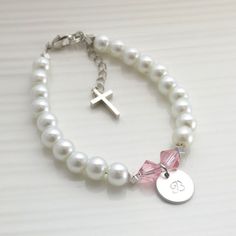 Baby girls baptism gift girls christening giftchristening | Etsy Elegant Personalized Jewelry For Confirmation, Personalized Pink Rosary Bracelet For Baptism, Personalized Cross Rosary Bracelet For Baptism, Elegant Handmade Jewelry For First Communion, Personalized Silver Name Bracelet For Baptism, Customizable Cross Jewelry For Baptism, Personalized White Bracelet For Baptism, Handmade Cross Bracelets For First Communion, Spiritual Jewelry For Baptism And Mother's Day