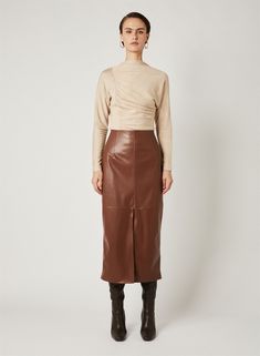 • Esmaee Rocco Midi Skirt • Luxe vegan leather fabrication • Fully Lined • Fitted waistband • Zipper on back • Split on front • Mindfully created • Calf length Style No: 2288.5855 Content: 100% Vegan Leather Lining: 100% Polyester Model height: 178cm / 5' 10in | Model wears size XS Style Brown Leather Skirt, Burgundy Leather Skirt, Brown Leather Skirt Outfit Fall, Midi Leather Skirt Outfit, Leather Skirt Outfit Fall, Leather Skirt Long, Leather Skirt Midi, Brown Leather Skirt Outfit, Faux Leather Skirt Outfit