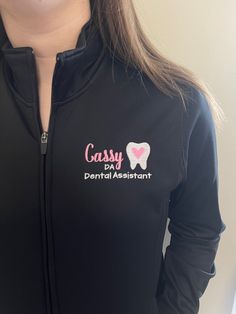 "This cute dental assistant design is perfect to celebrate any professional in this field and makes a perfect staple for your own wardrobe.  All of our items are made on high quality products, not lower end pieces. We offer the design shown in the main listing photo on unisex quarter zip sweatshirts and four different types of full-zip jackets available in ladies cut and unisex sizing.  See below for comments on sizing.  To see all of our dental designs click here: https://www.etsy.com/shop/Doub Cute Dental Assistant Scrubs, Dental Assistant Costume Ideas, Dental Assistant Essentials, Dental Assistant Must Haves, Certified Dental Assistant, Dental Embroidery Designs, Dental T Shirts Design, Dental Office Shirts, Dental Assistant Nails